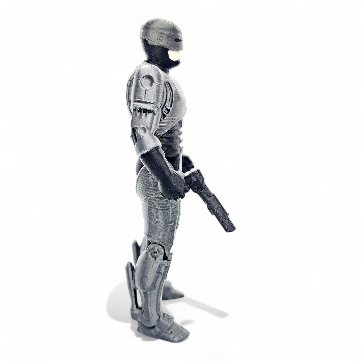 RoboCop posed, side profile highlighting visor and chest plate