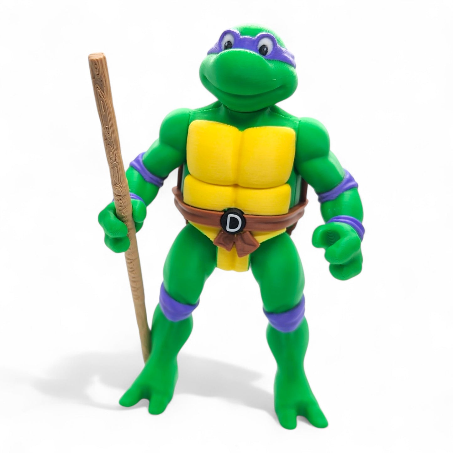 Donatello vintage action figure front view holding bo staff