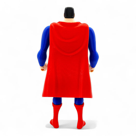 Animated-style Superman retro action figure in classic blue and red, back view