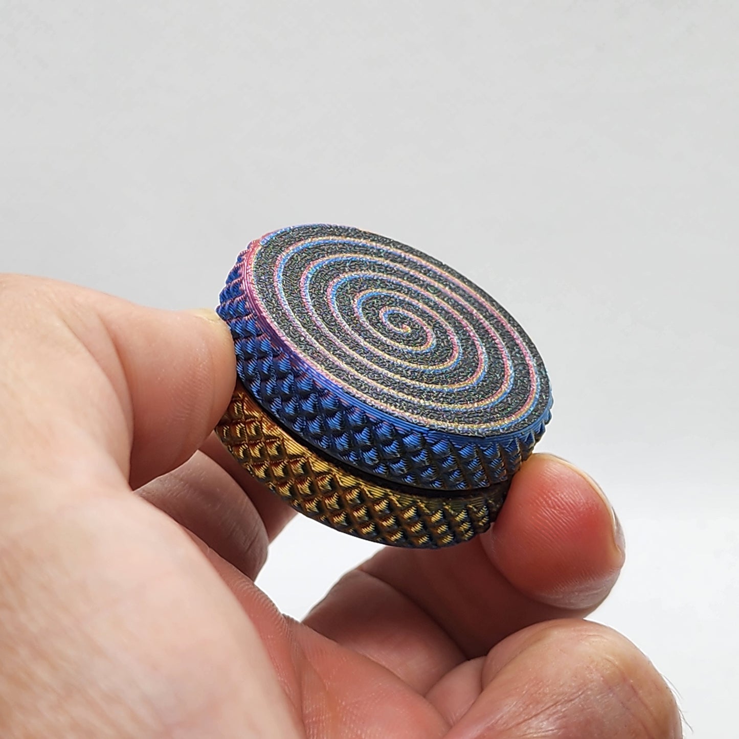 In-hand spin demonstration of magnetic coin.