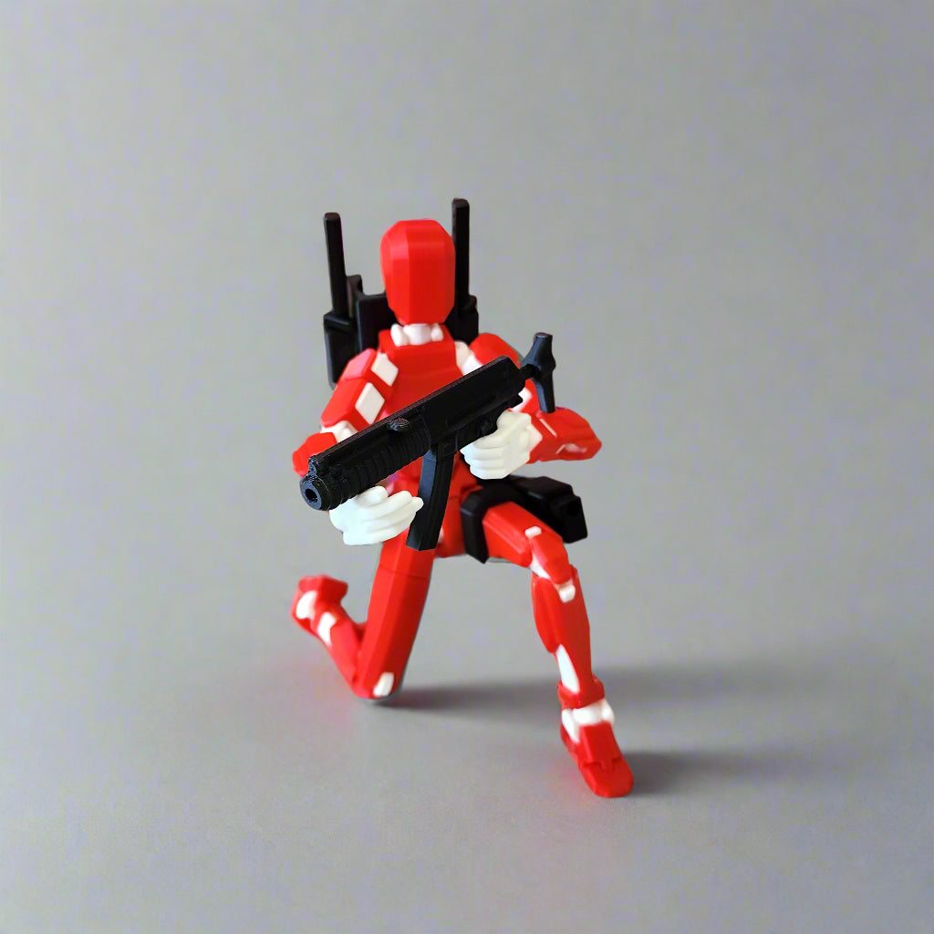 Pax-style Dummy 13 figure in dynamic pose with weapons drawn, showcasing articulation and oversized scale.