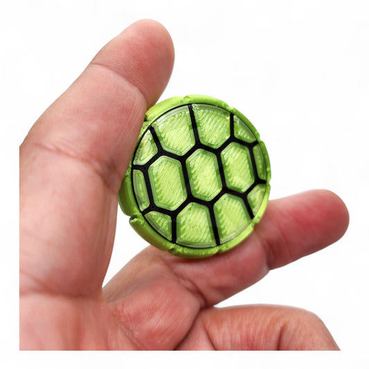 Flipster Haptic Pop Coin – Reptilian front view
