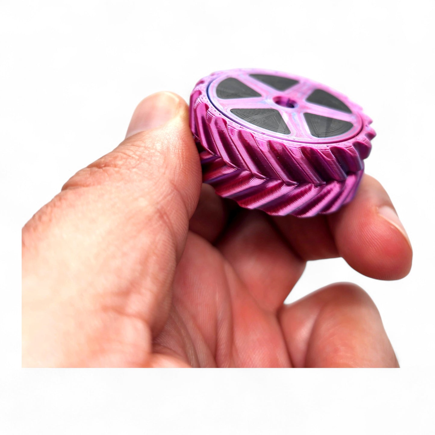 Flipster Haptic Pop Coin – Gear/Wheel Spinner in hand