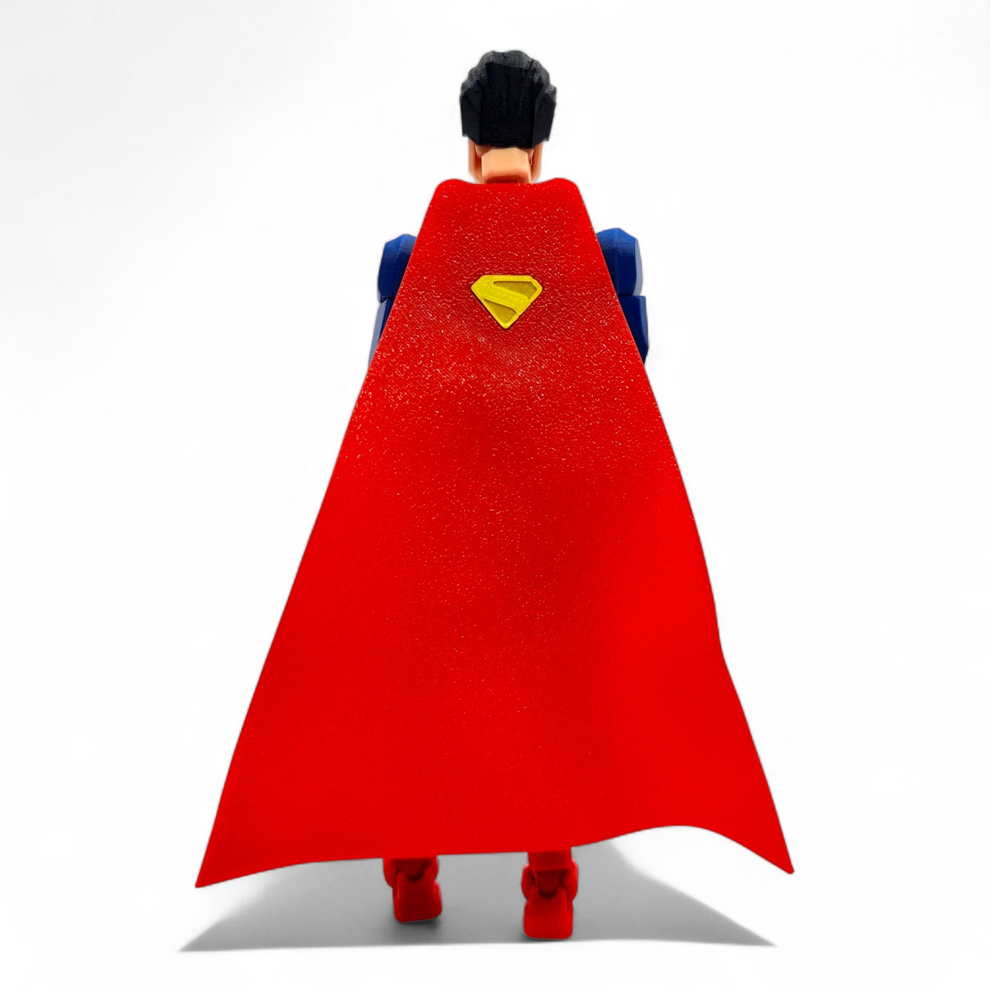 Close-up of Superman Dummy 13 chest emblem and cape mount